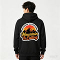 Unisex black cotton hoodie with large back graphic and hood